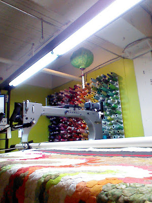 quilt being basted on longarm