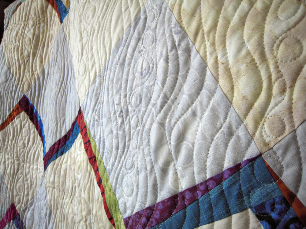 freehand wavy quilt pattern created on longarm machine