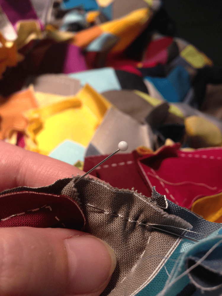 running stitch on kaleidoscope quilt