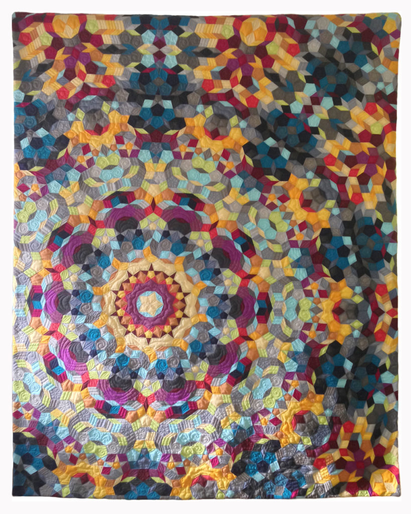 Kaleidoscope hand pieced quilt