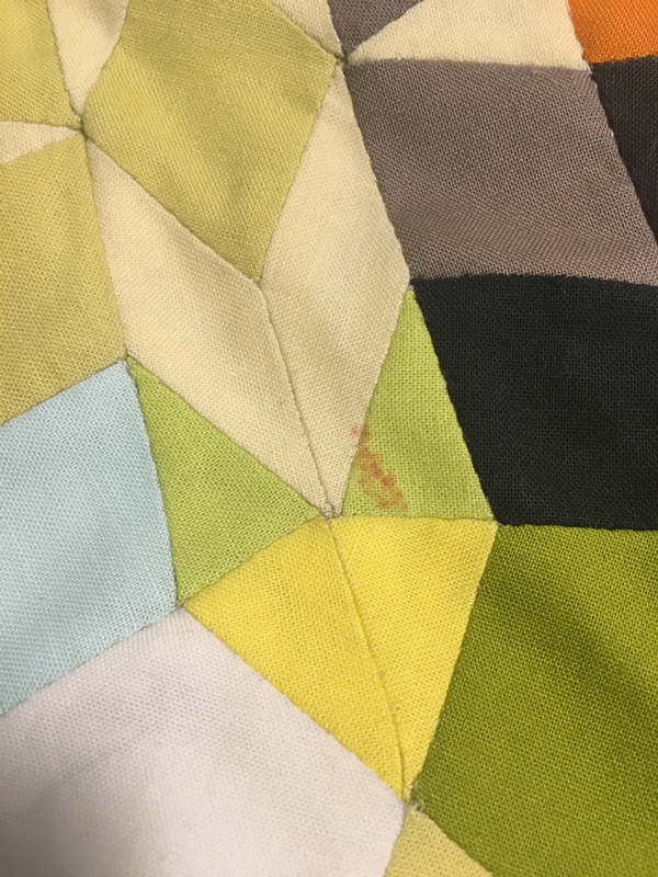 Quilt fix: smudge of red on a quilt to clean