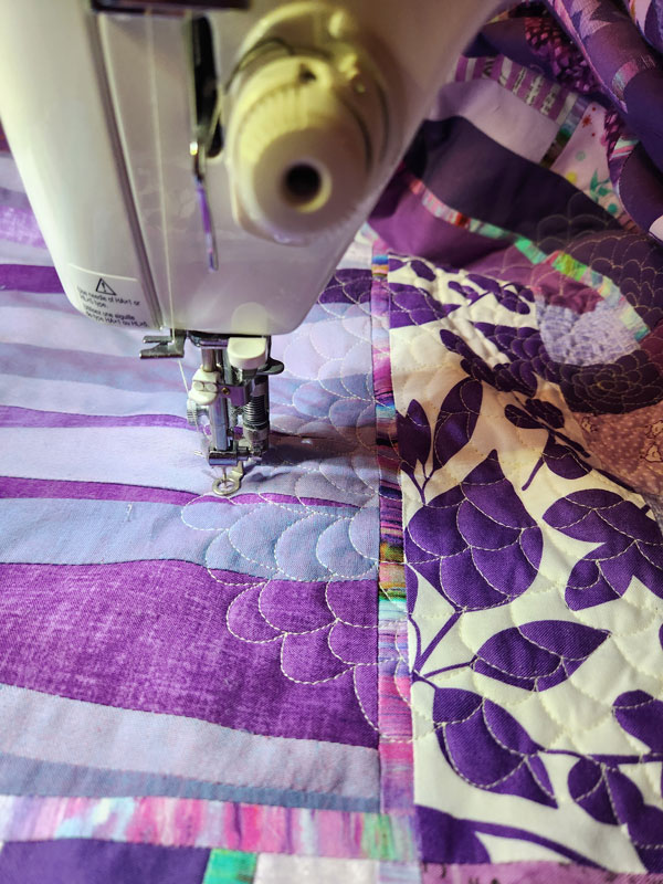 free motion quilting the Purple Jungle Quilt