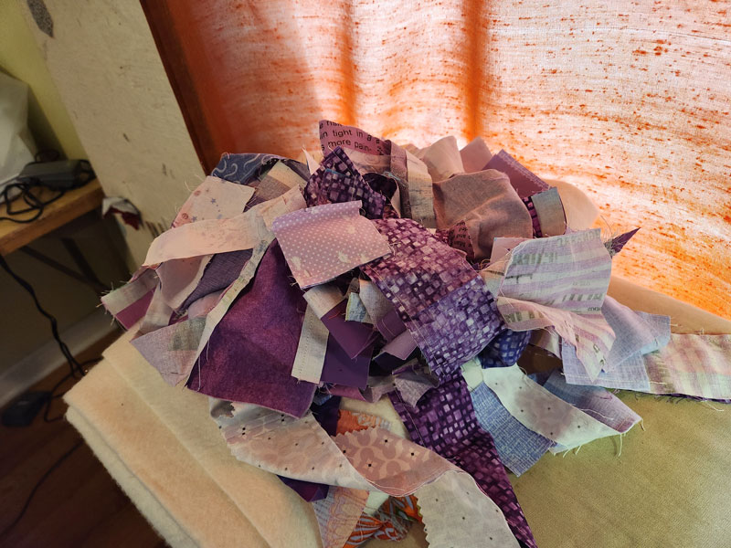 Pile of purple fabric scraps