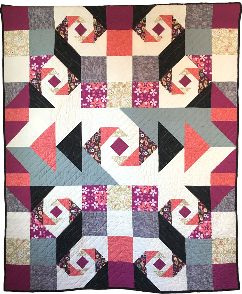 Swirling Oceans Quilt in Pink