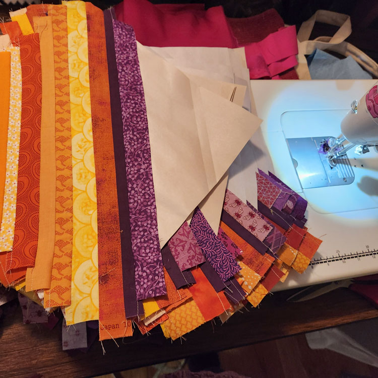 String Quilt: Adding purple strips