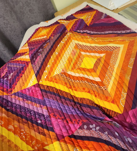 Quilting on a string quilt